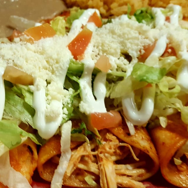 Kid traditional enchilada combo.
